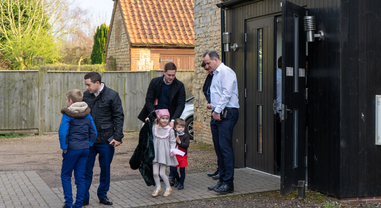 Plymouth Brethren members leaving church